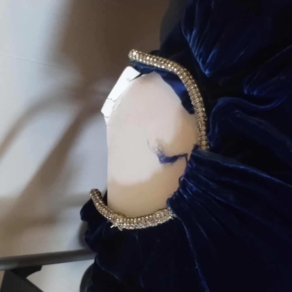 Blue velvet dress with costume jewelry